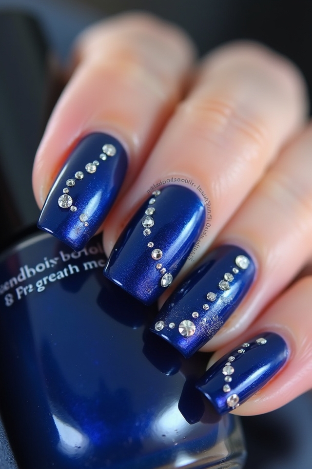 sapphire blue rhinestone manicure